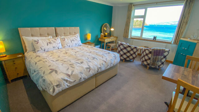 Our large and comfortable Superking rooms with views overlooking Loch Portree